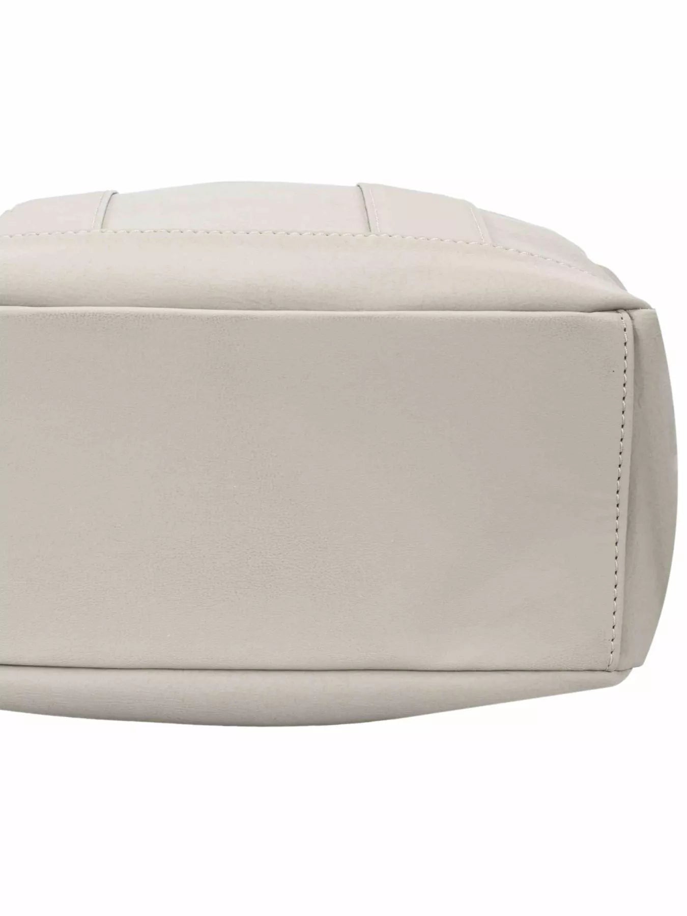 Canvas backpack bag side panel with stitched trim, light cream color
