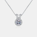 Silver rabbit-ear pendant necklace with round moissanite center and V-shaped pavé top