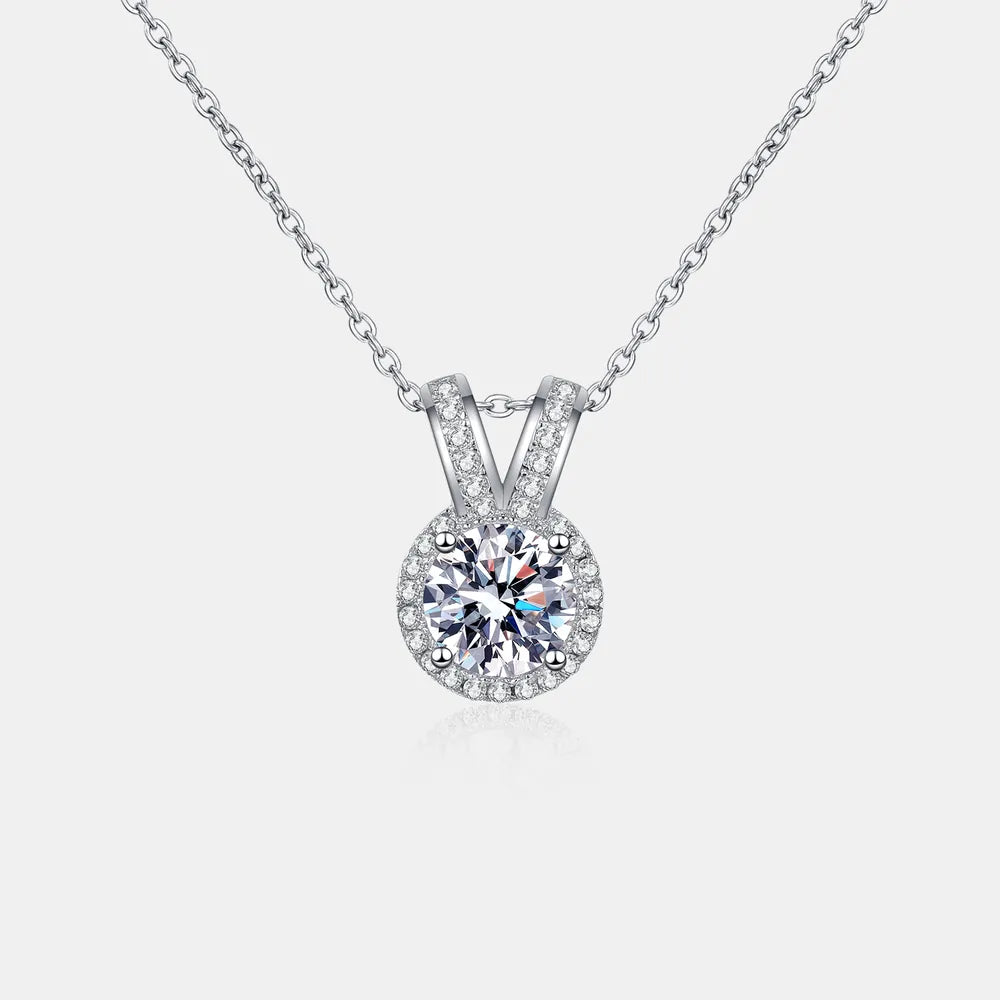 Silver rabbit-ear pendant necklace with round moissanite center and V-shaped pavé top