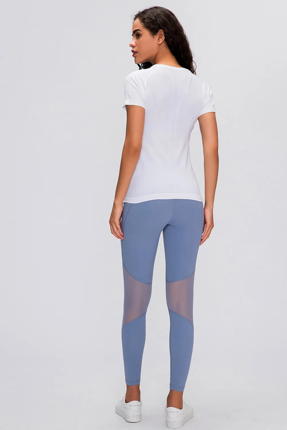 White round-neck short-sleeve active t-shirt, back view.