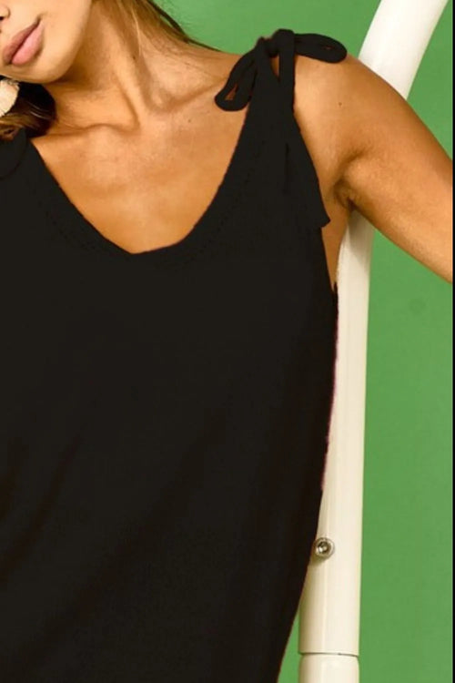 Black knit tank top with tie-strap shoulders and scoop neckline