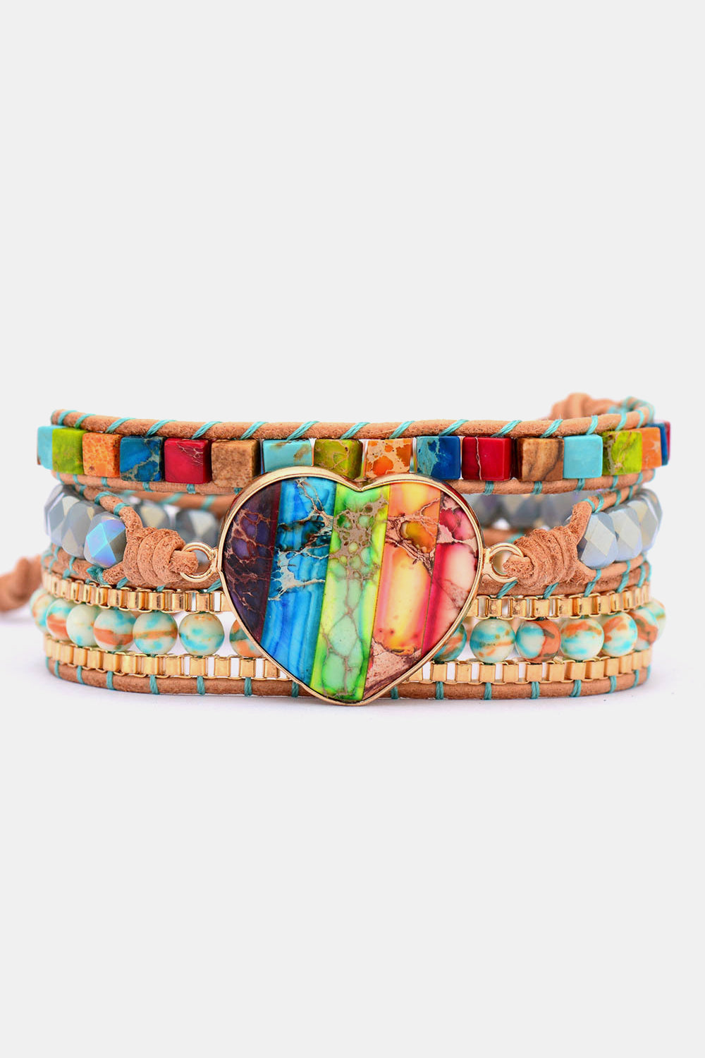 Layered beaded bracelet with heart-shaped multicolor crystal pendant and woven straps