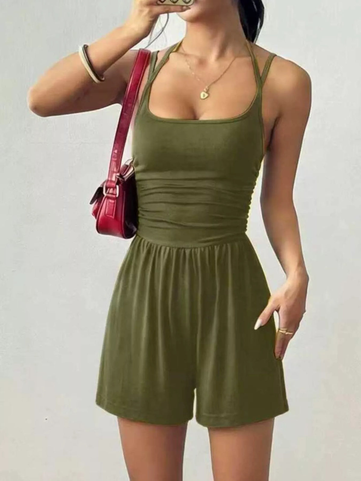 Ruched spaghetti-strap romper in olive green, gathered waist, short romper legs