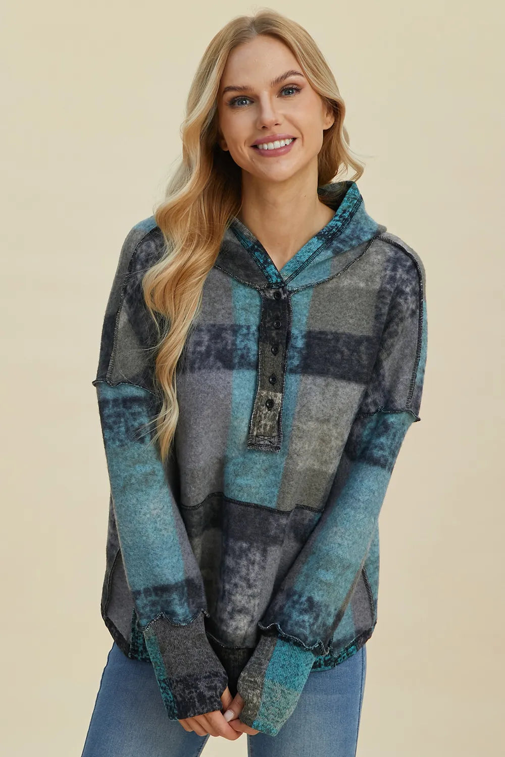 Multicolor plaid fleece hoodie with hood and half-zip placket, front view with sleeves