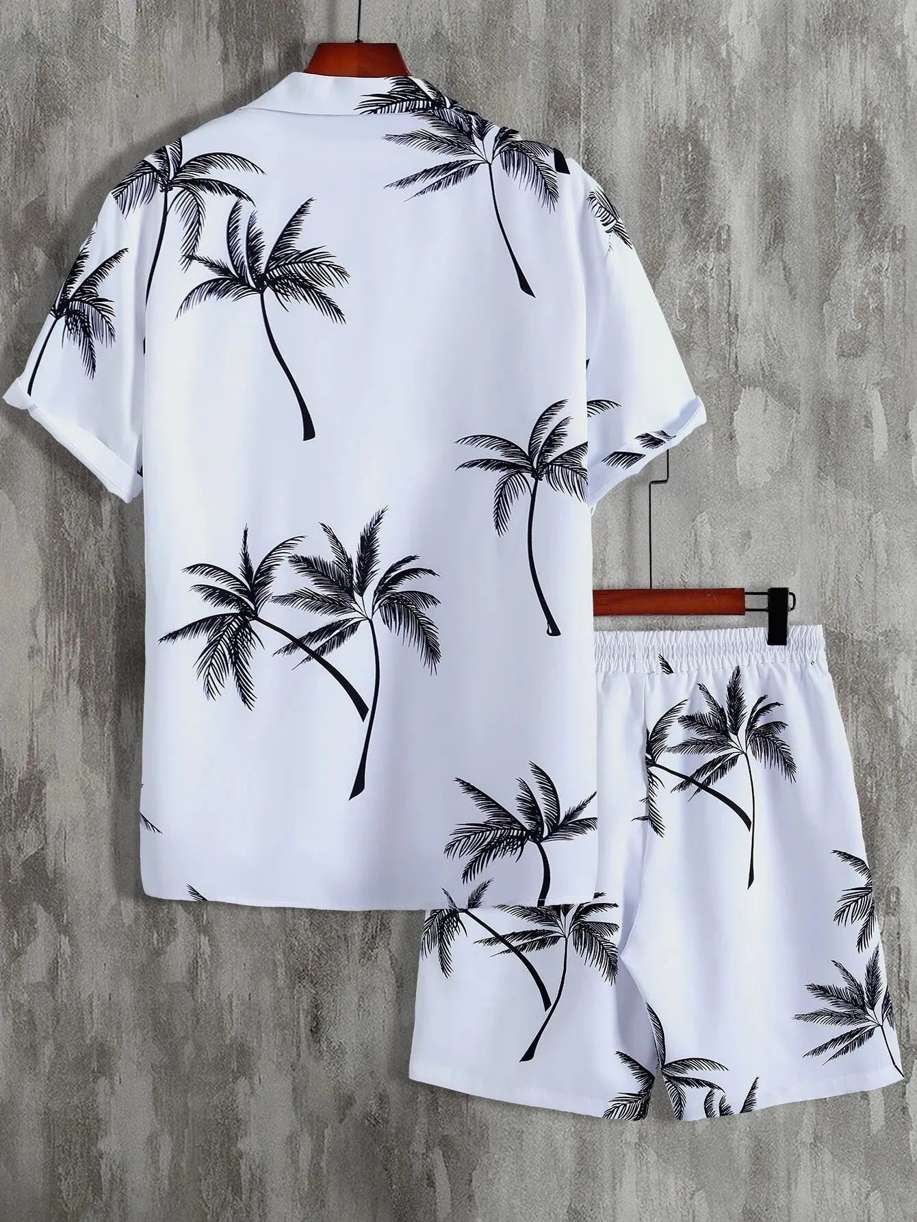 Men's palm print button-up shirt and shorts set, white with dark palm frond pattern.