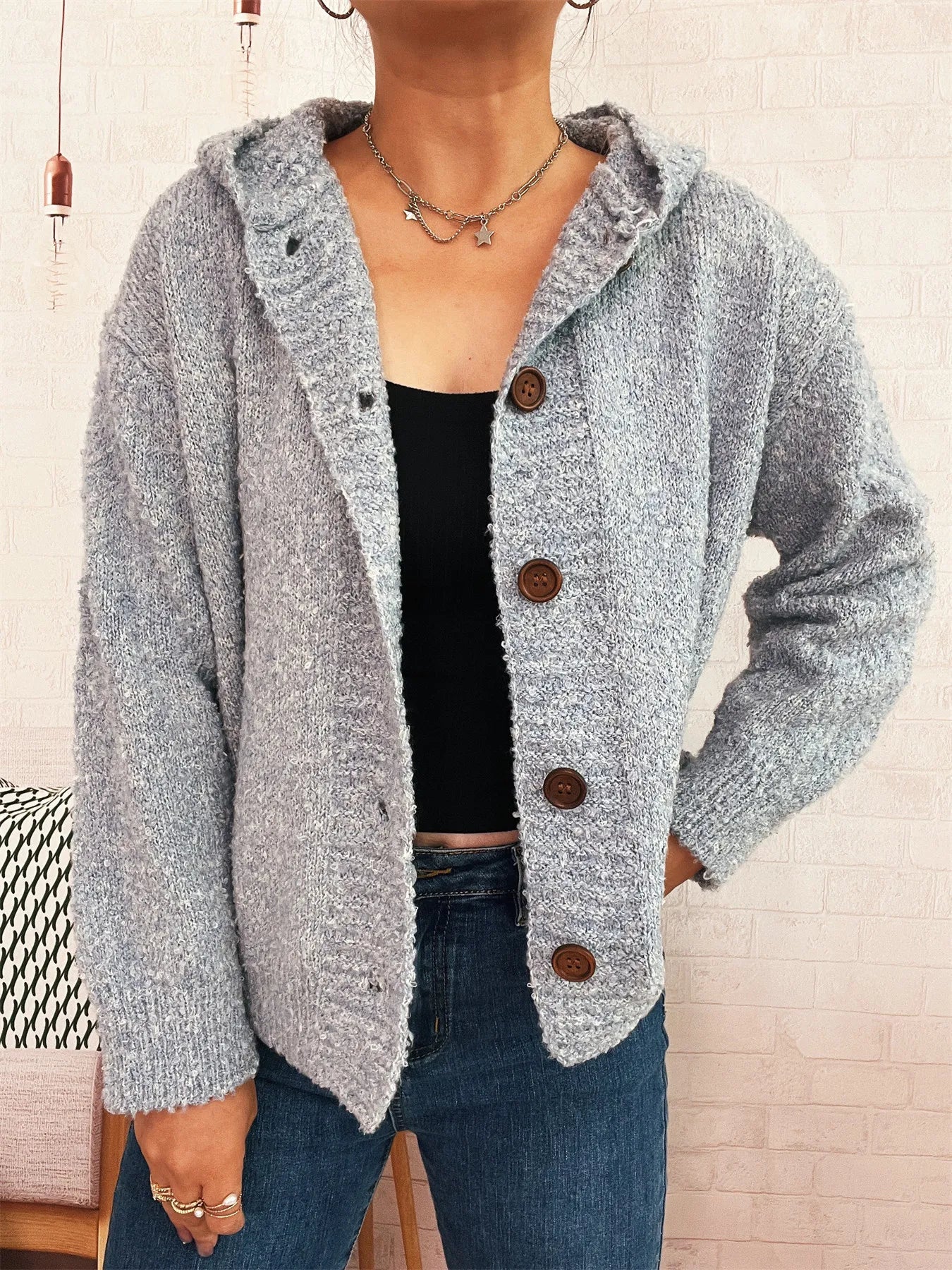 Heather gray-blue hooded cardigan with long sleeves and four-button front placket