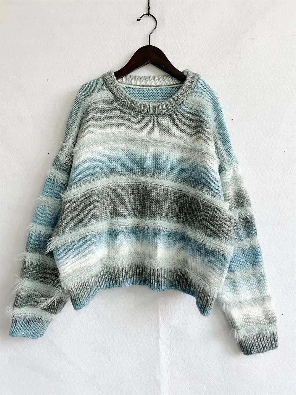 Light blue striped round-neck long-sleeve sweater with ribbed hem and cuffs