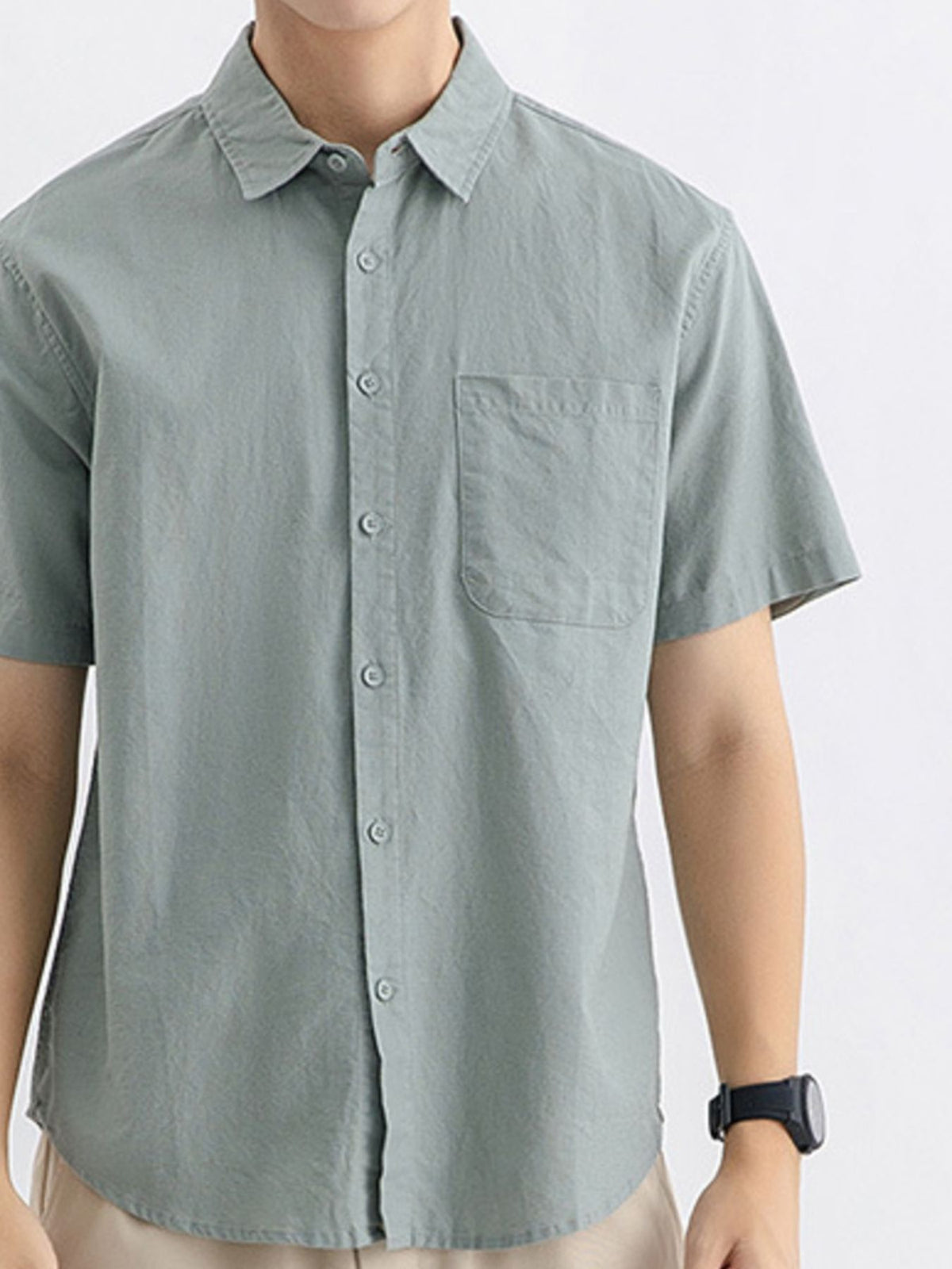 Men's relaxed-fit short sleeve button-up shirt in sage green, chest pocket and buttons
