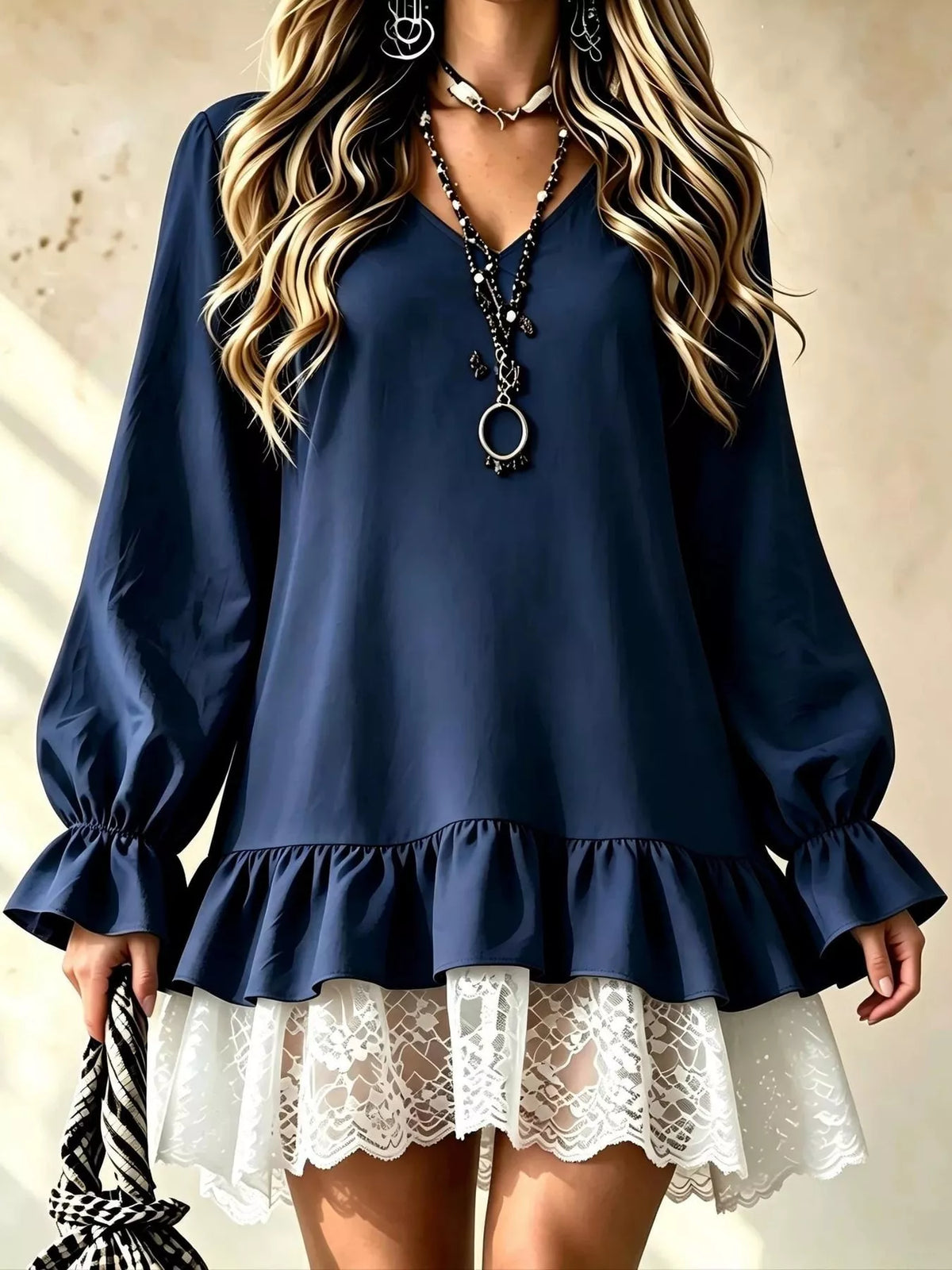 Navy V-neck flounce sleeve dress with puff cuffs and lace hem overlay