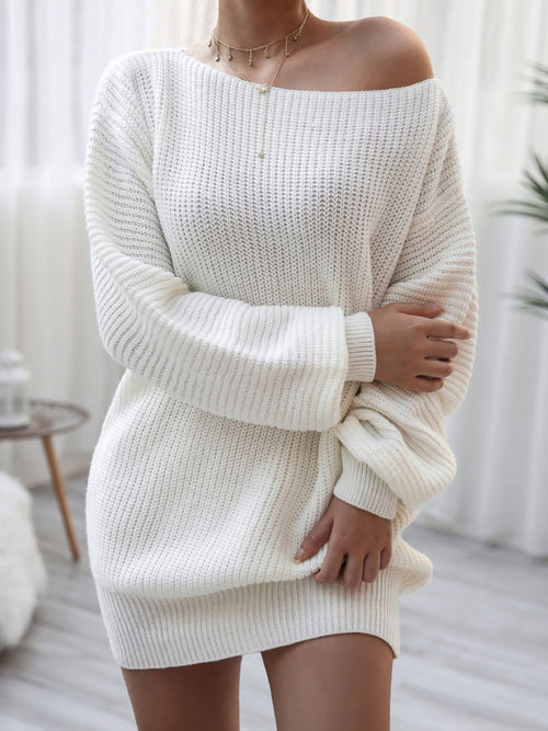 White sweater mini dress with boat neck and balloon sleeves, wide ribbed cuffs