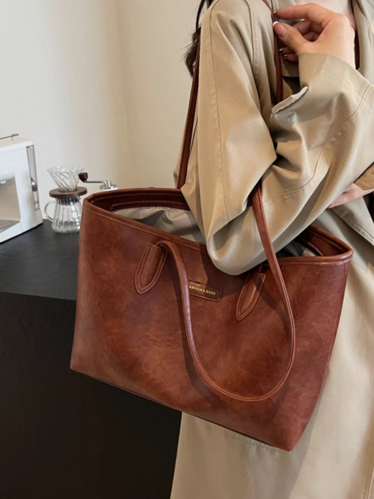 Brown vegan leather large tote bag with front pocket and double shoulder straps