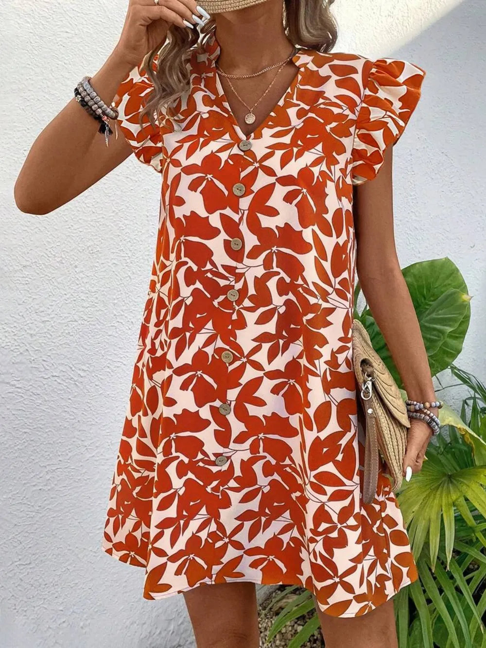 Printed Notched Cap Sleeve Mini Dress in orange floral print with front buttons
