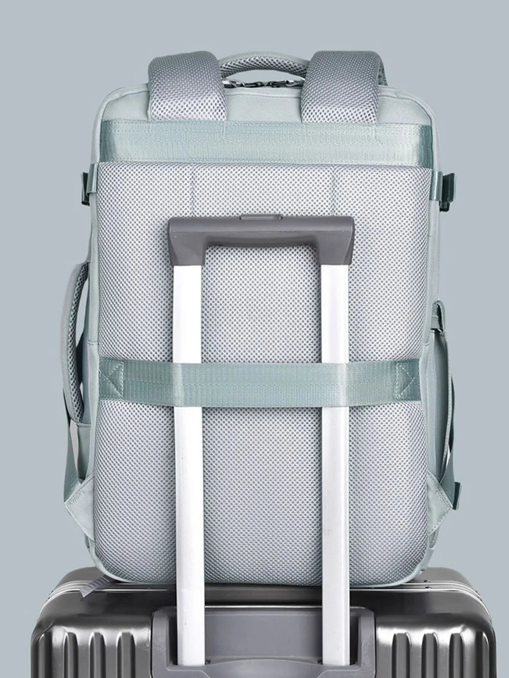 Light gray backpack interior support frame visible through open top