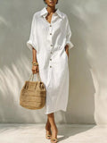 White button-front shirt dress with short sleeves and collared neckline