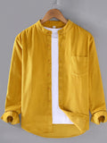 Men's long-sleeve button-up shirt in ginger yellow, with front buttons and chest pocket