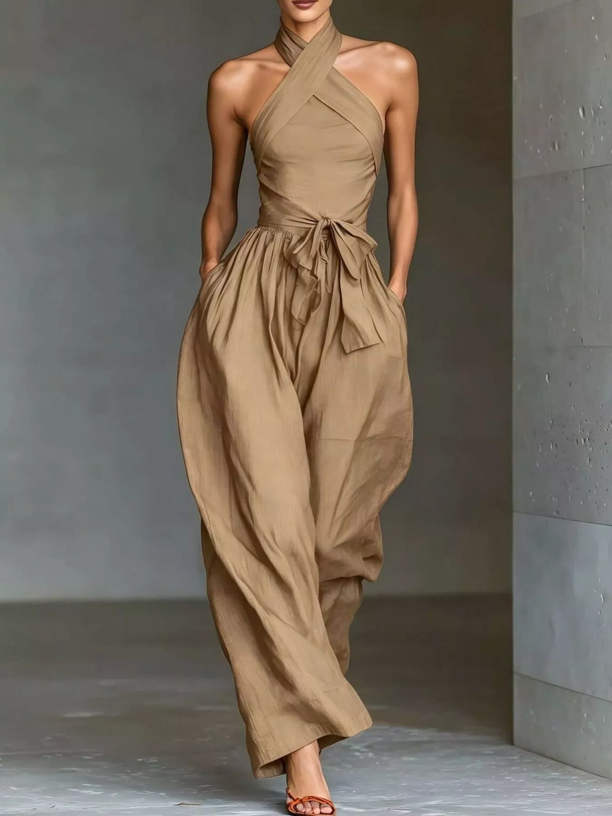 Khaki halter neck wide-leg jumpsuit with waist tie and gathered bib detail