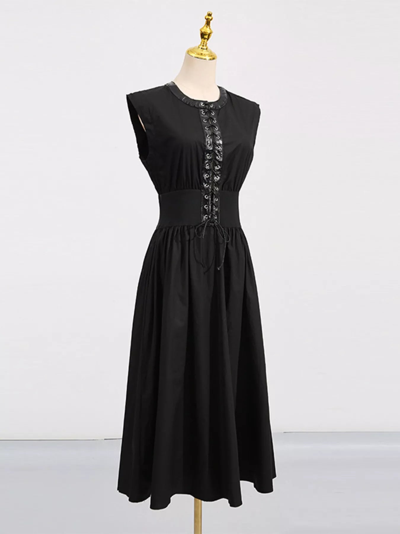 Cedar & Moore Lace-Up Corset Sleeveless Midi Dress in black with lace-up front and pockets