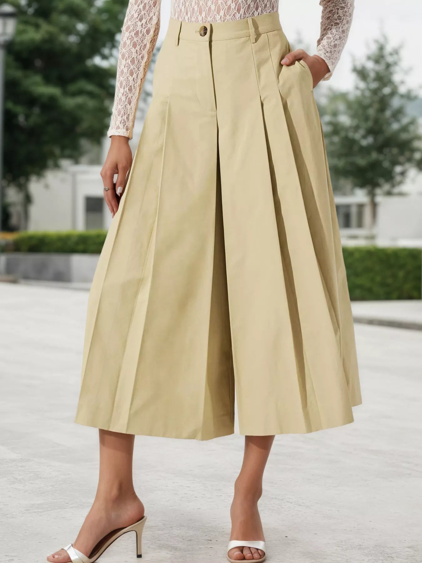 Khaki high-waisted pleated wide-leg cropped pants with button front and belt loops