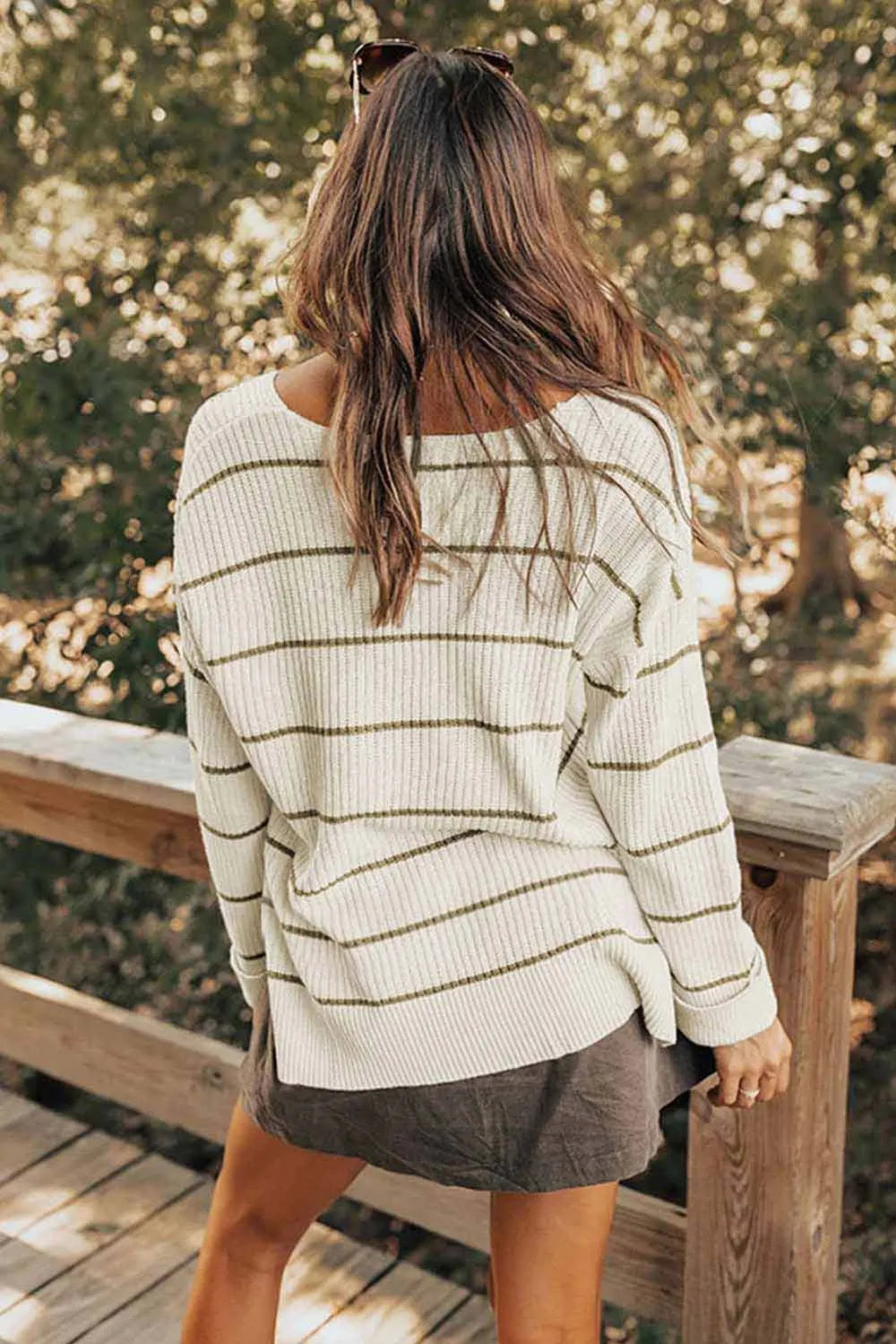 White striped knit sweater, straight back yoke and ribbed cuffs