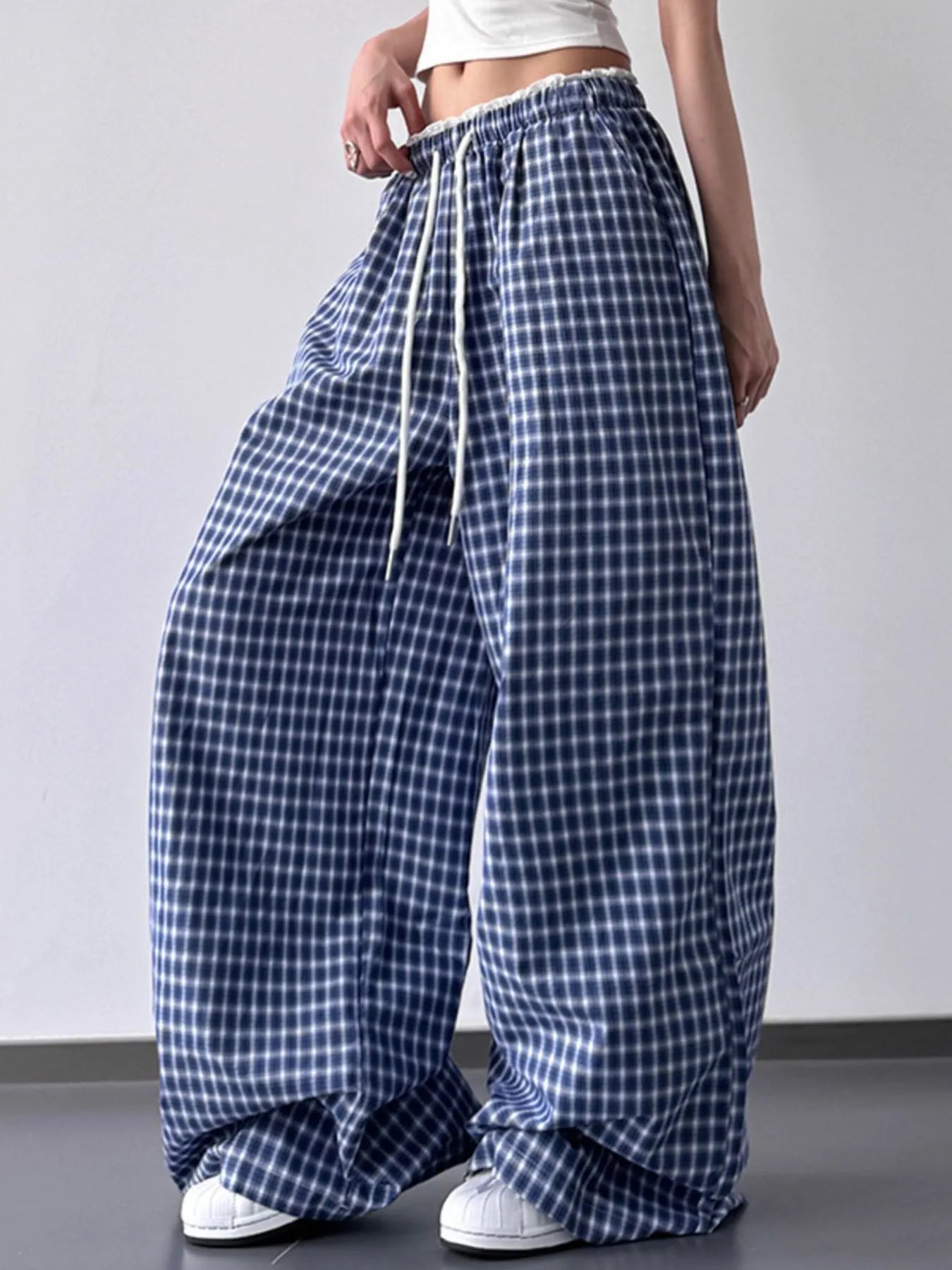 Drawstring plaid wide-leg pants in blue with white grid, gathered elastic waist