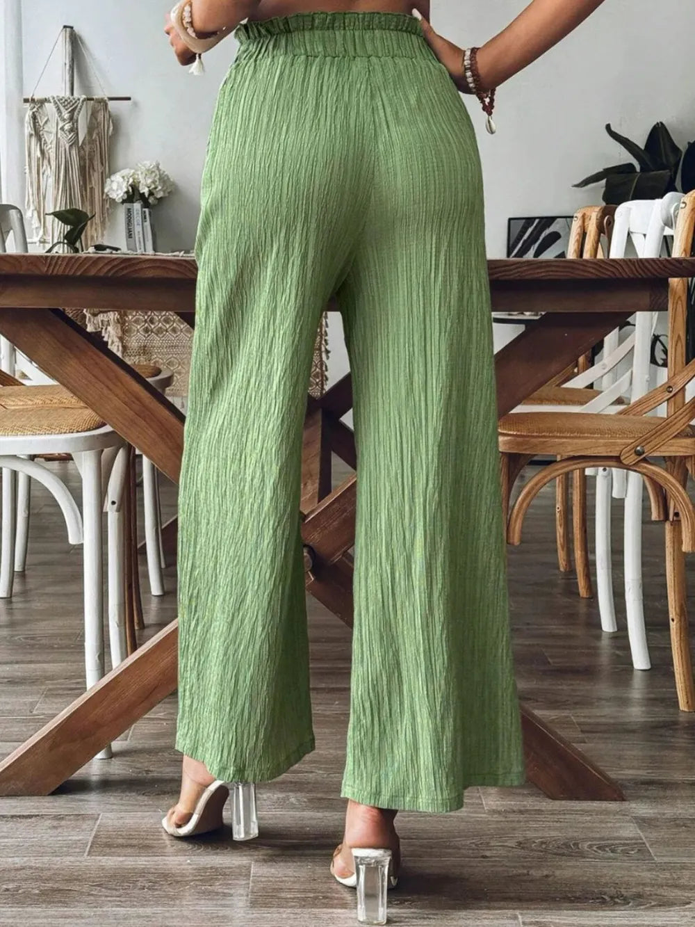 Frill wide-leg pants in green with elastic waistband and flowing wide-leg fit