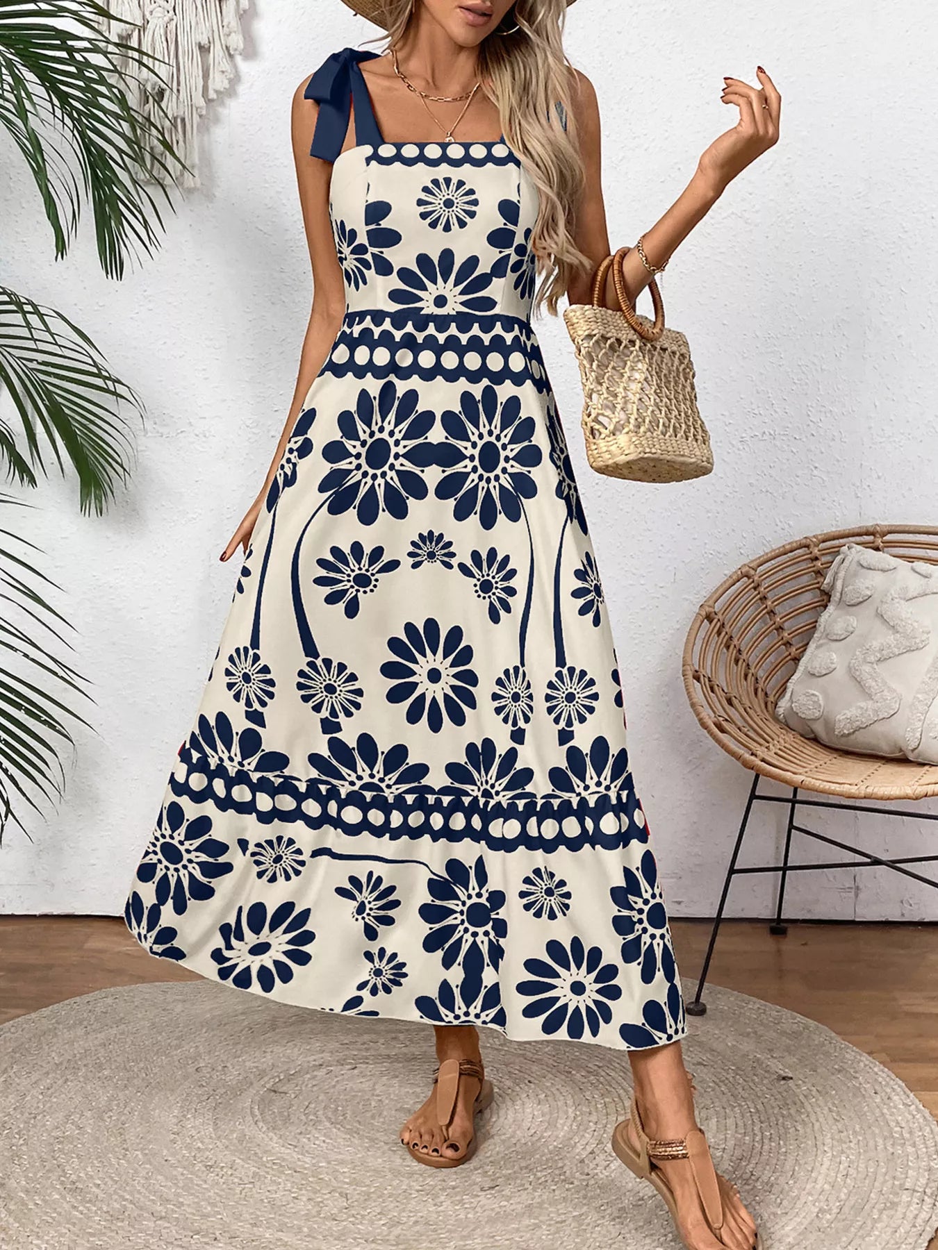 Dark blue floral tie-shoulder midi dress with scalloped hem and tiered pattern
