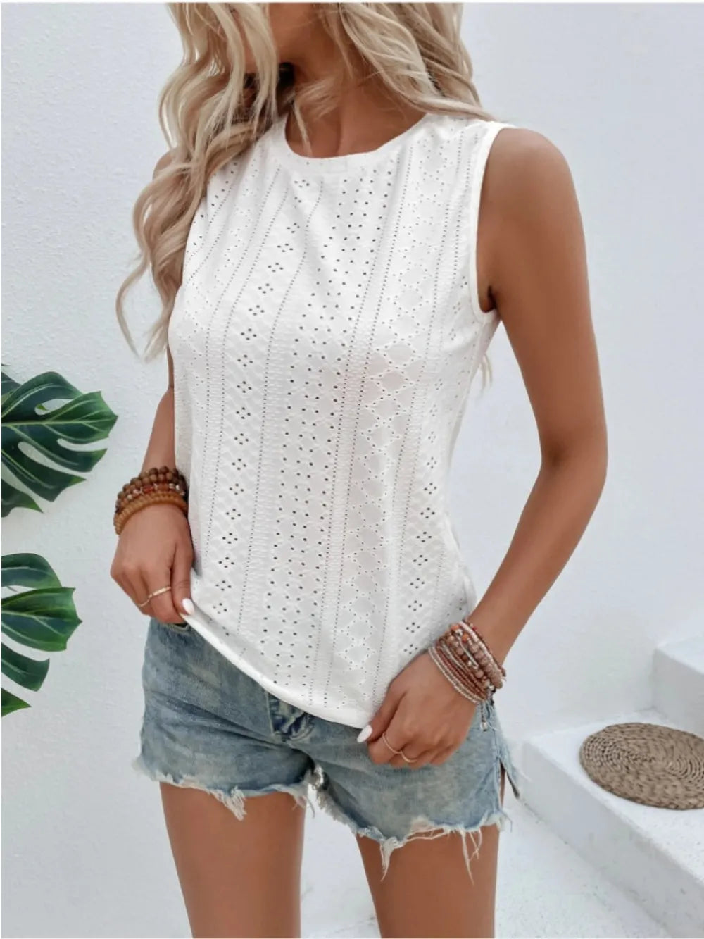Eyelet round-neck tank in white, sleeveless with vertical eyelet panel front