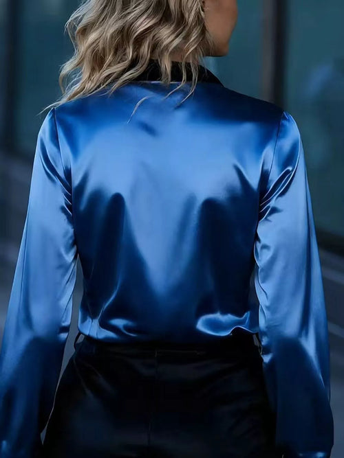Blue long-sleeve button-up shirt, back view