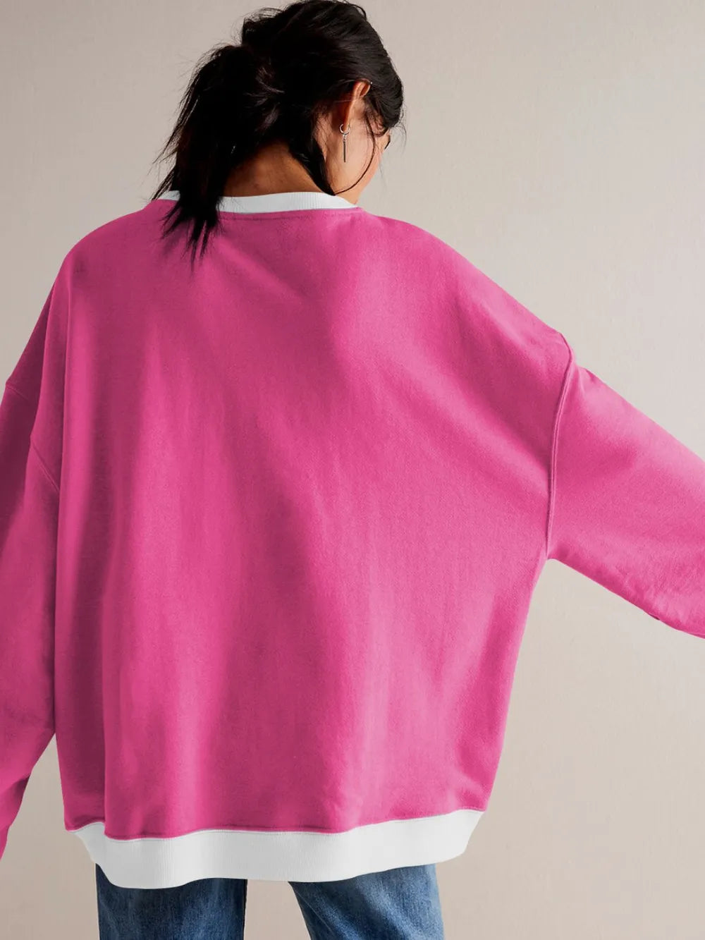Deep rose long-sleeve sweatshirt with white contrast hem and neckline trim, back view