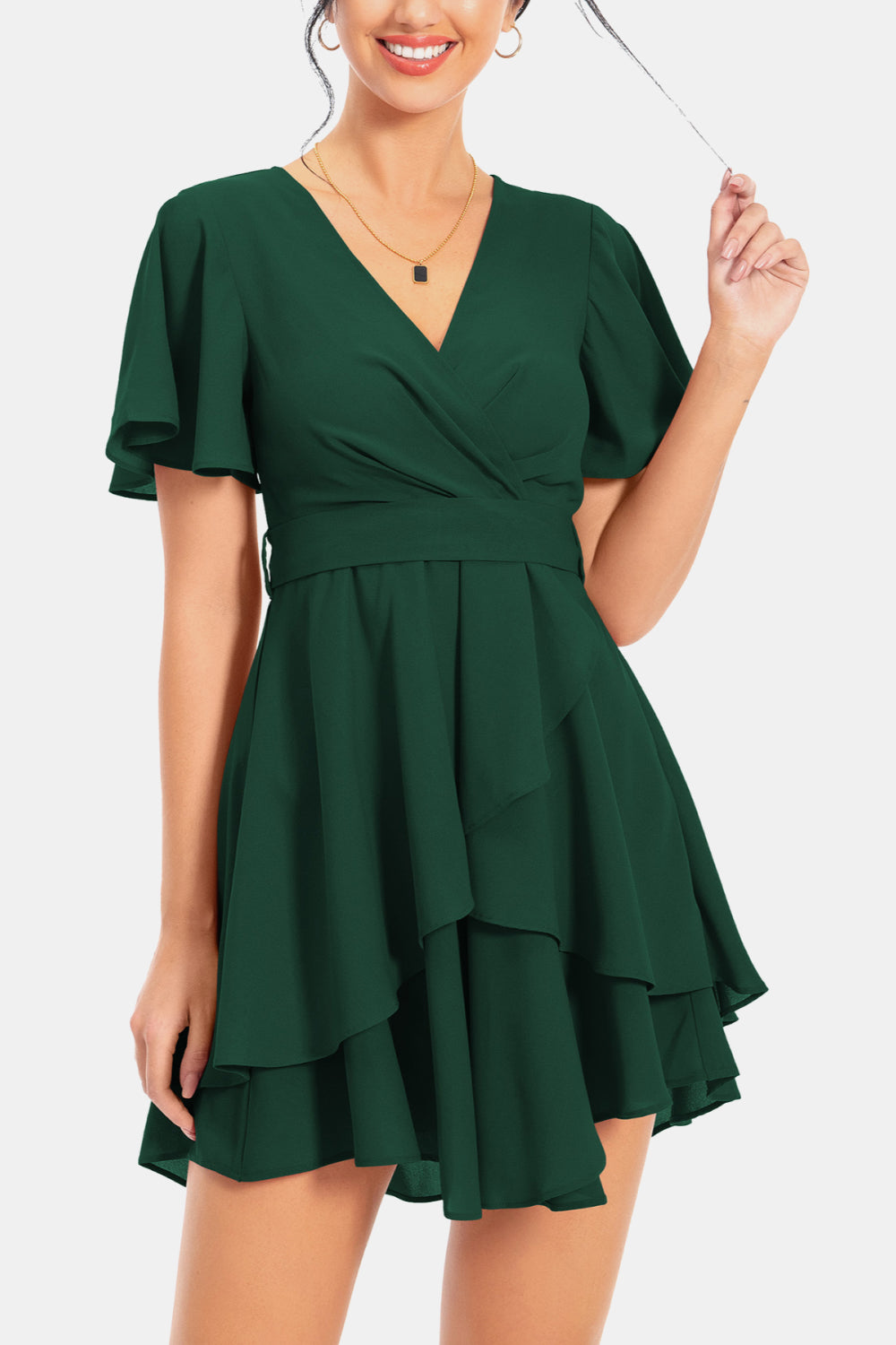 Dark green surplice V-neck flutter sleeve tiered mini dress with belted waist