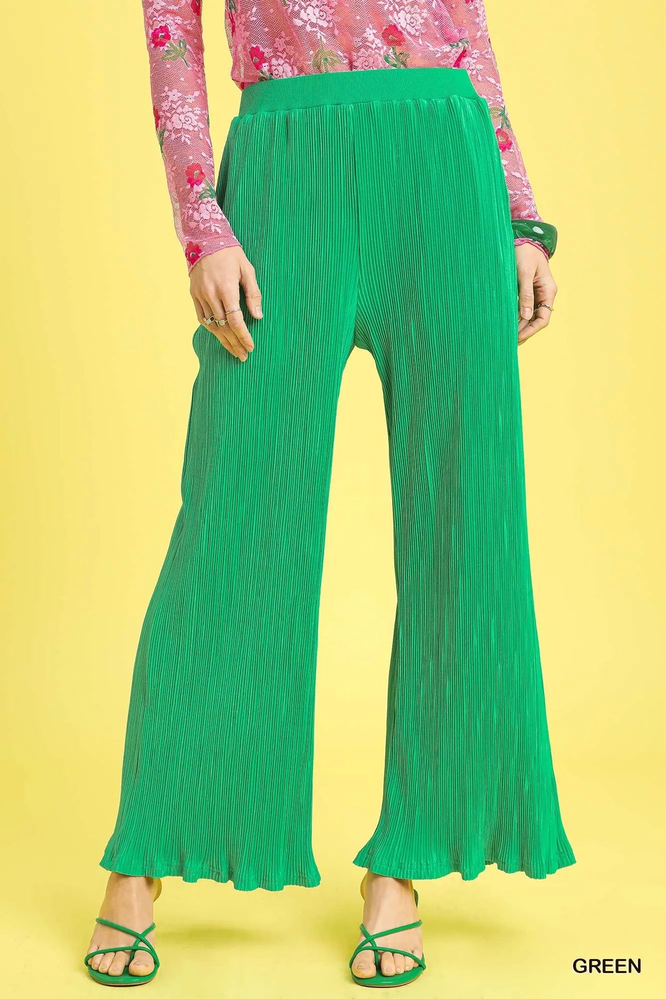 Green textured wide-leg pants with straight wide legs and elastic waist