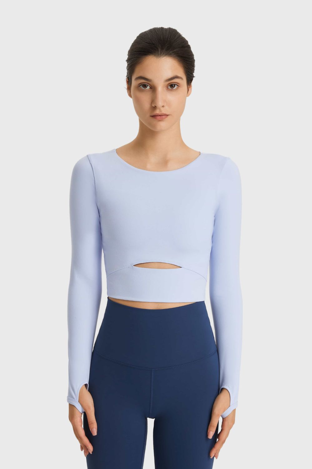 Light blue long-sleeve cropped sports top with waist cutout