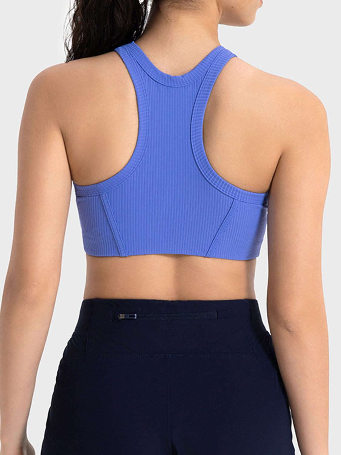 Blue ribbed cropped sport tank, back view, wide straps with center seam