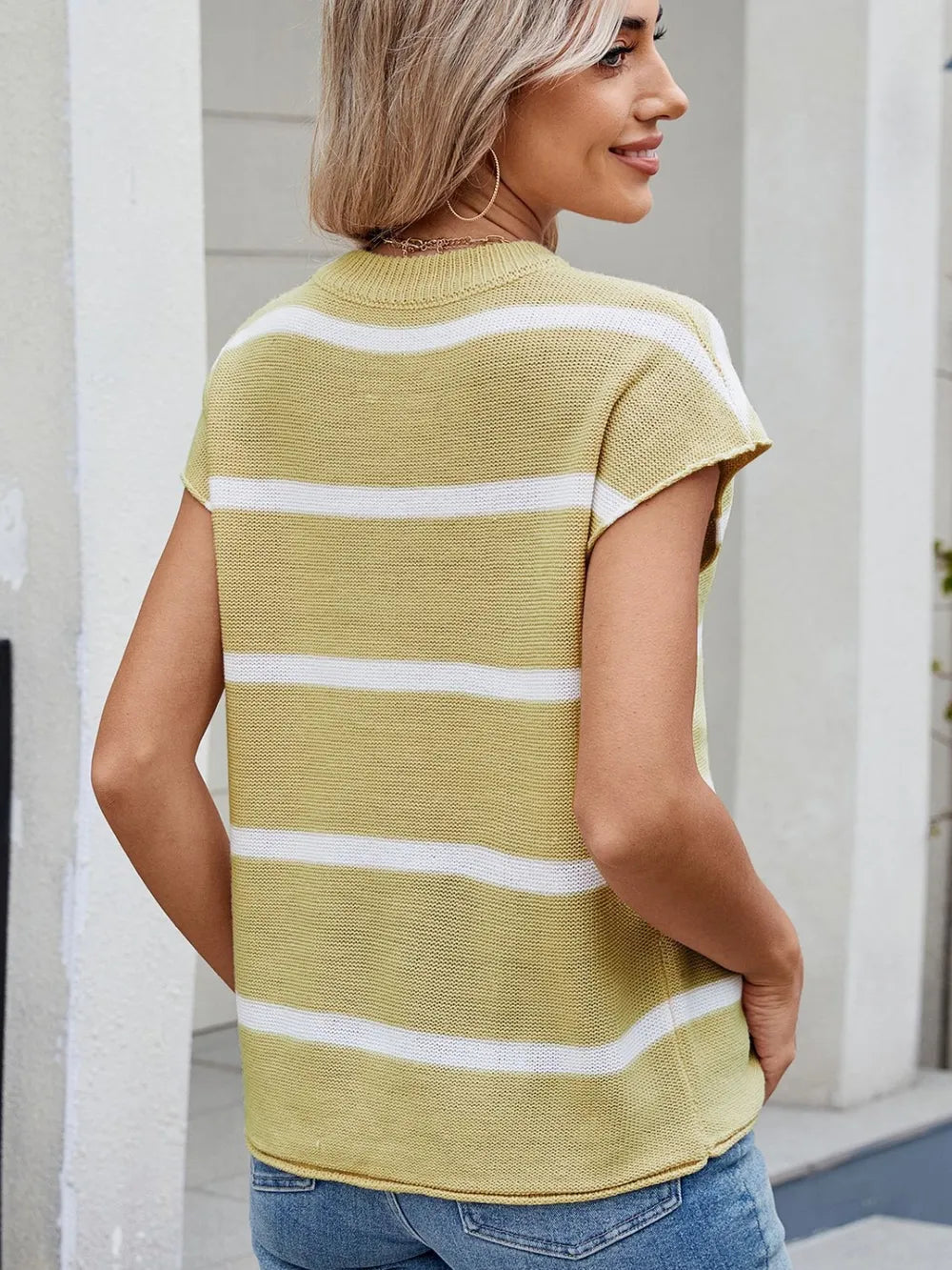 Chartreuse striped knit top with exposed seam and round neck, short sleeve back