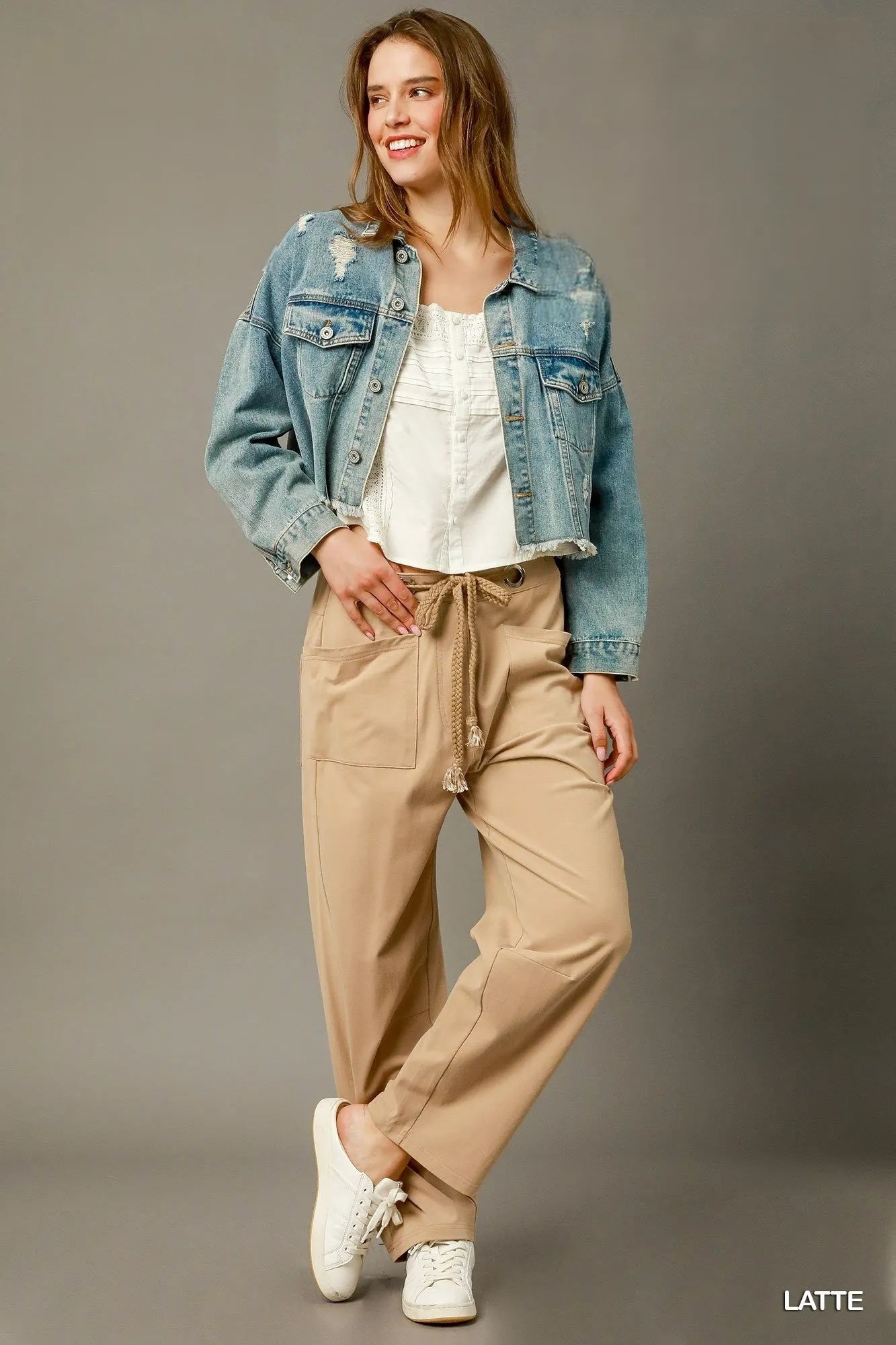 Latte cargo pants with drawstring waist, multiple pockets, and relaxed straight fit