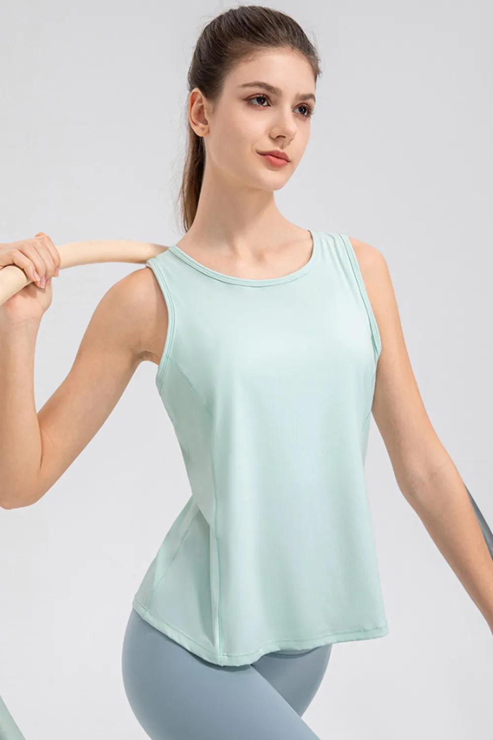 Women’s aqua active tank top with wide straps and round neckline