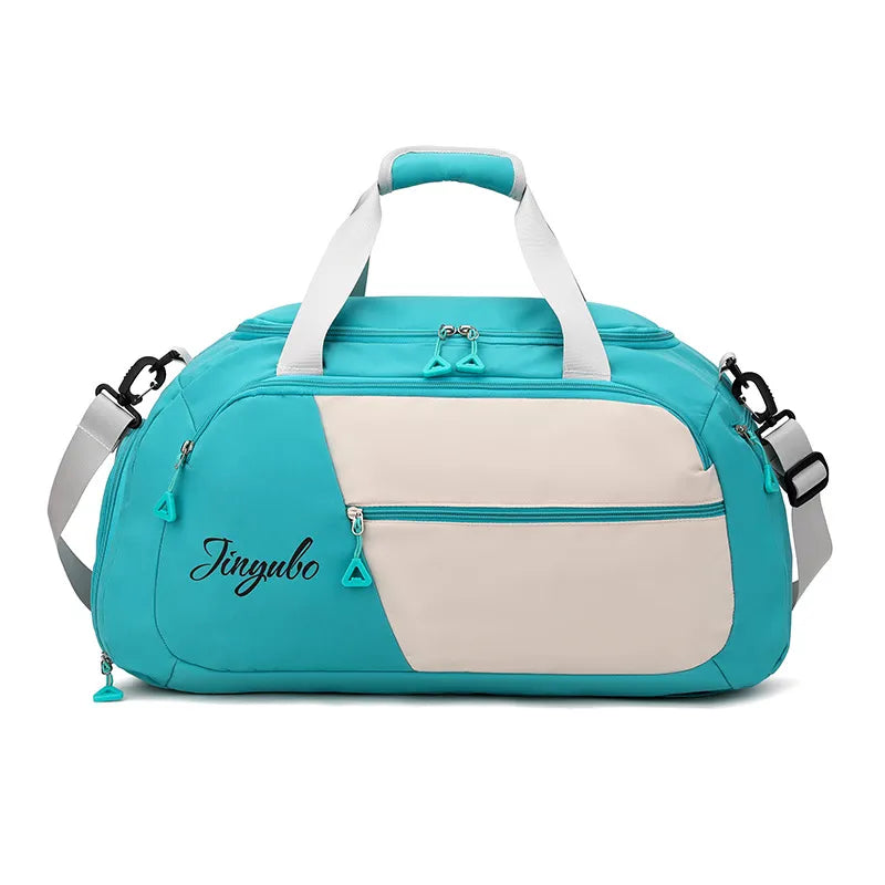 Large nylon travel duffel bag in aqua teal with contrast off-white front panel and zip front pocket
