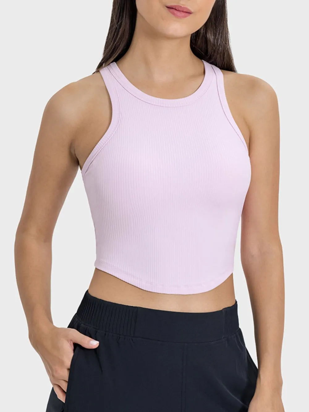 Blush pink ribbed active tank with round neckline and racerback, cropped fit