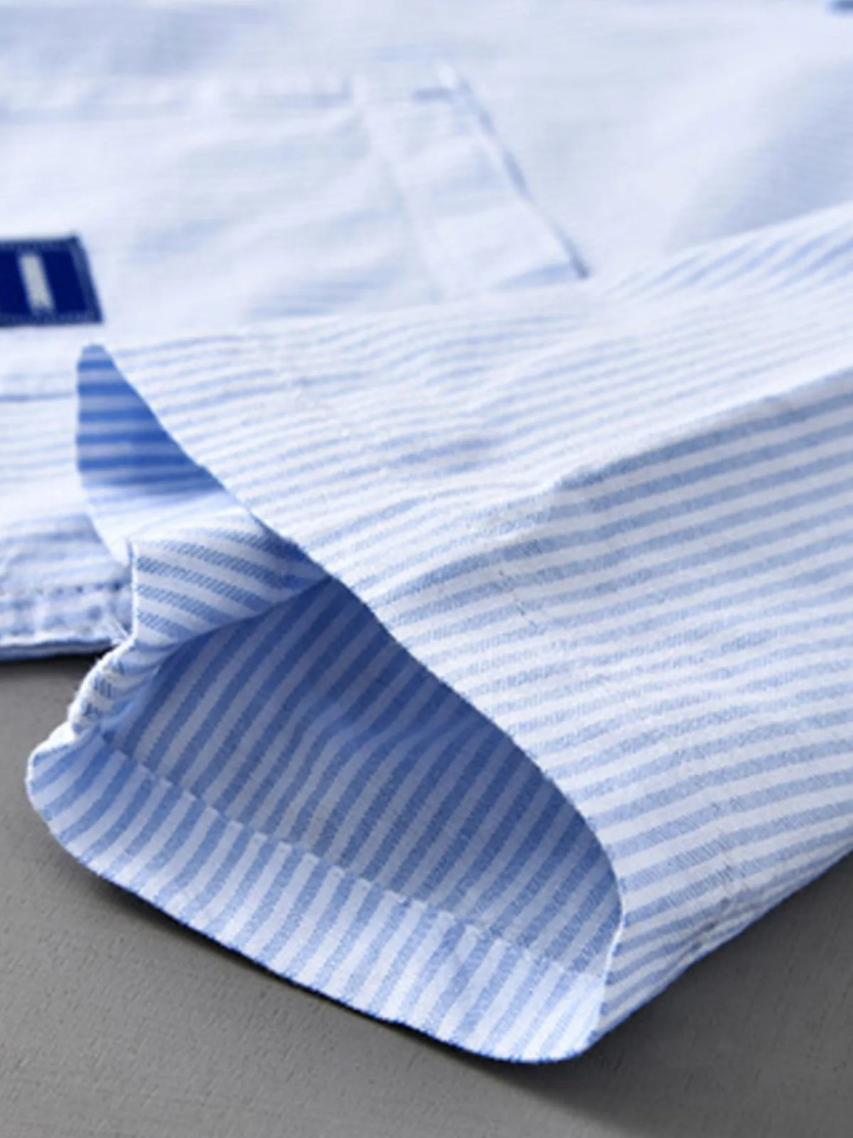 Mens blue striped cotton shirt sleeve hem