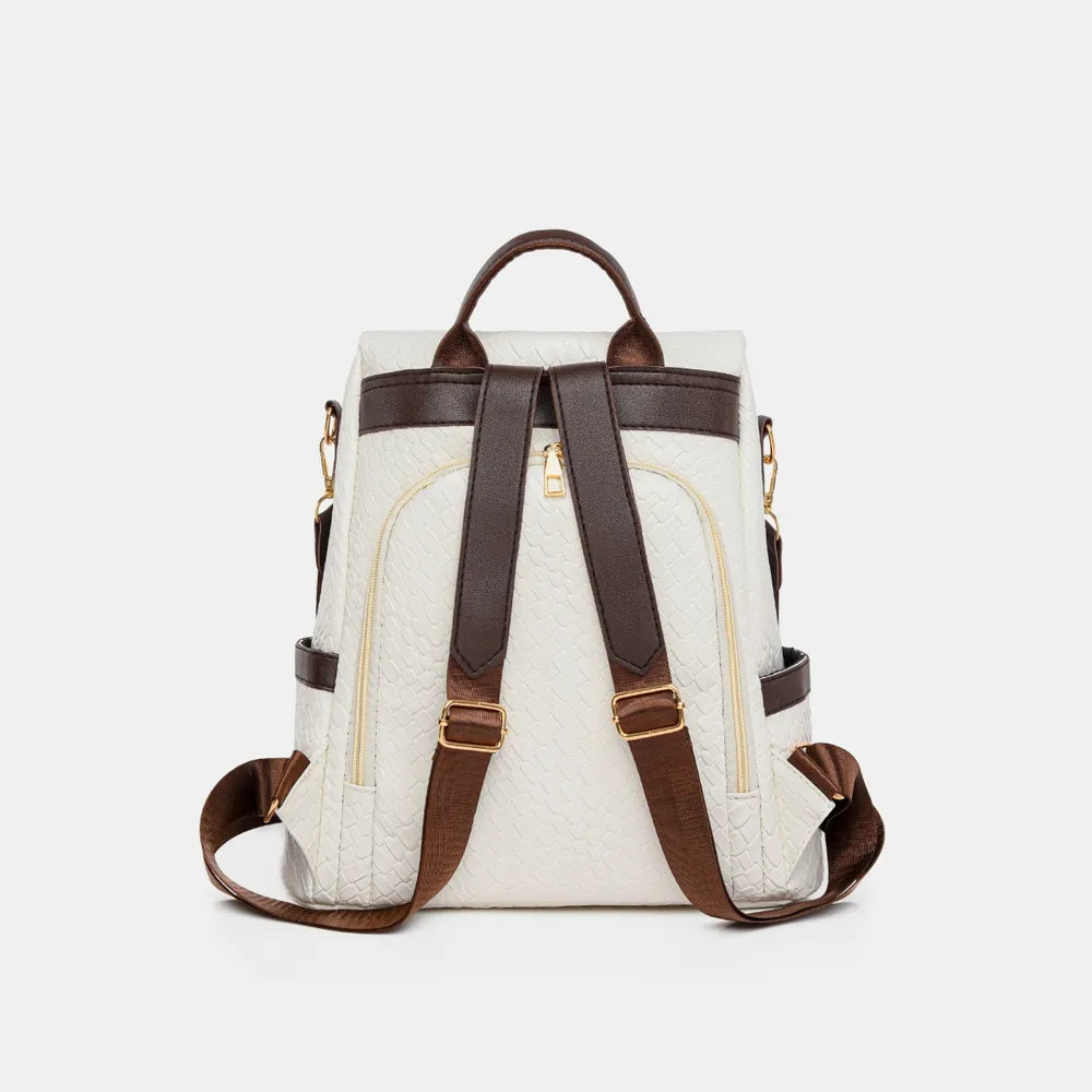 Vegan leather backpack bag in ivory with brown straps and front zipper detail.