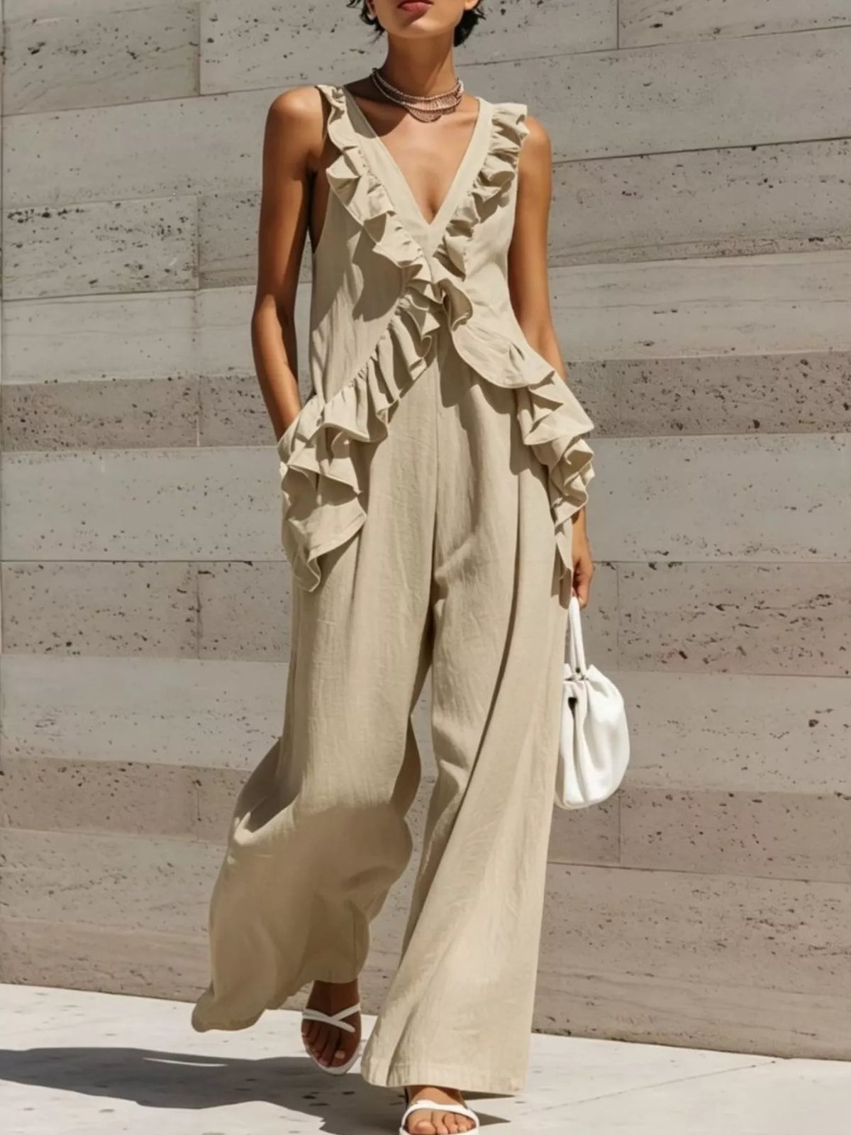Khaki ruffled V-neck sleeveless jumpsuit with layered ruffle front and wide-leg pants