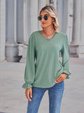 Gum leaf green eyelet V-neck blouse with flounce sleeves and gathered cuffs