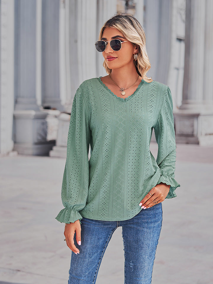 Gum leaf green eyelet V-neck blouse with flounce sleeves and gathered cuffs