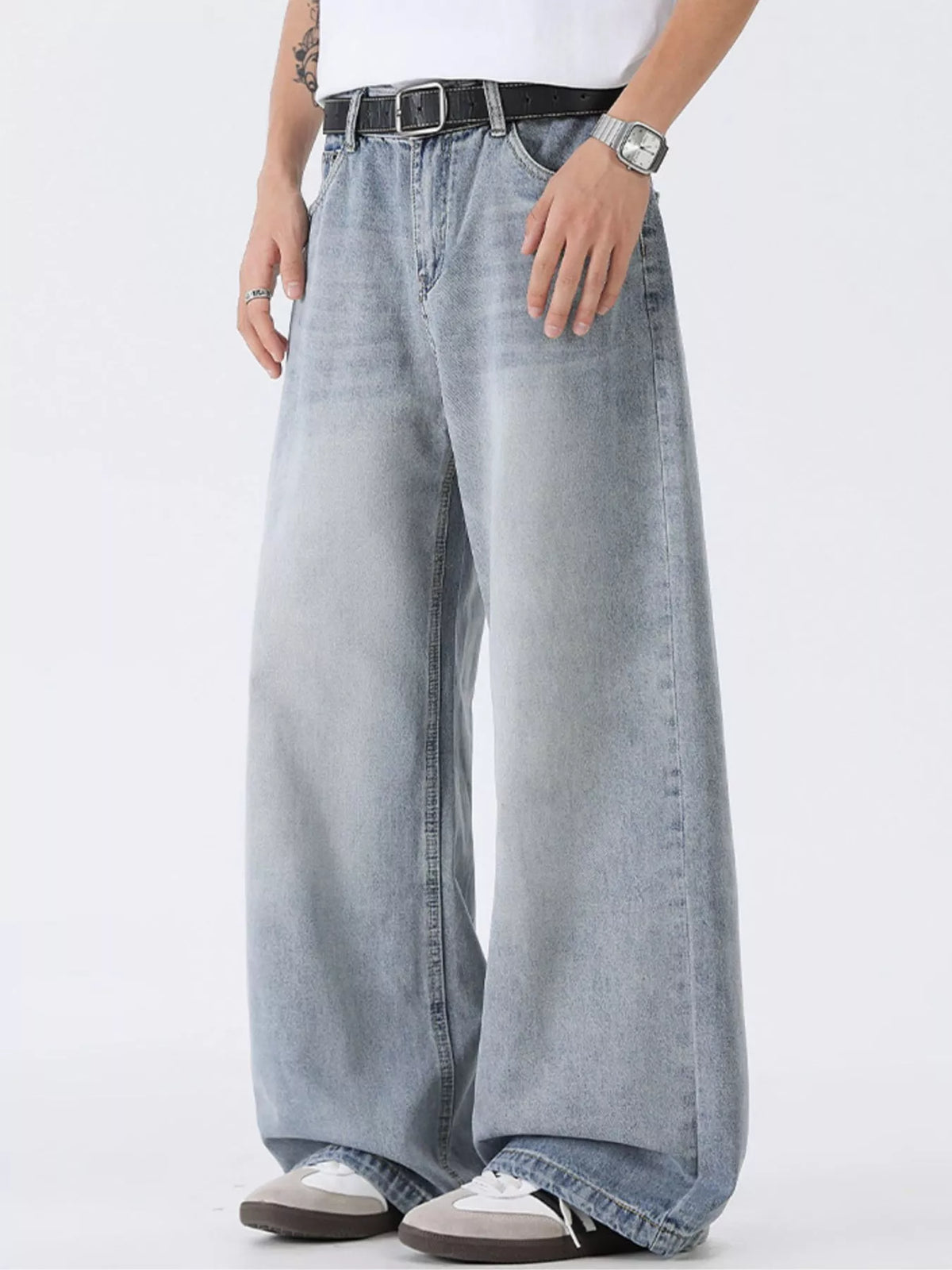 Washed wide-leg denim jeans, button fly, belt loops, roomy straight legs