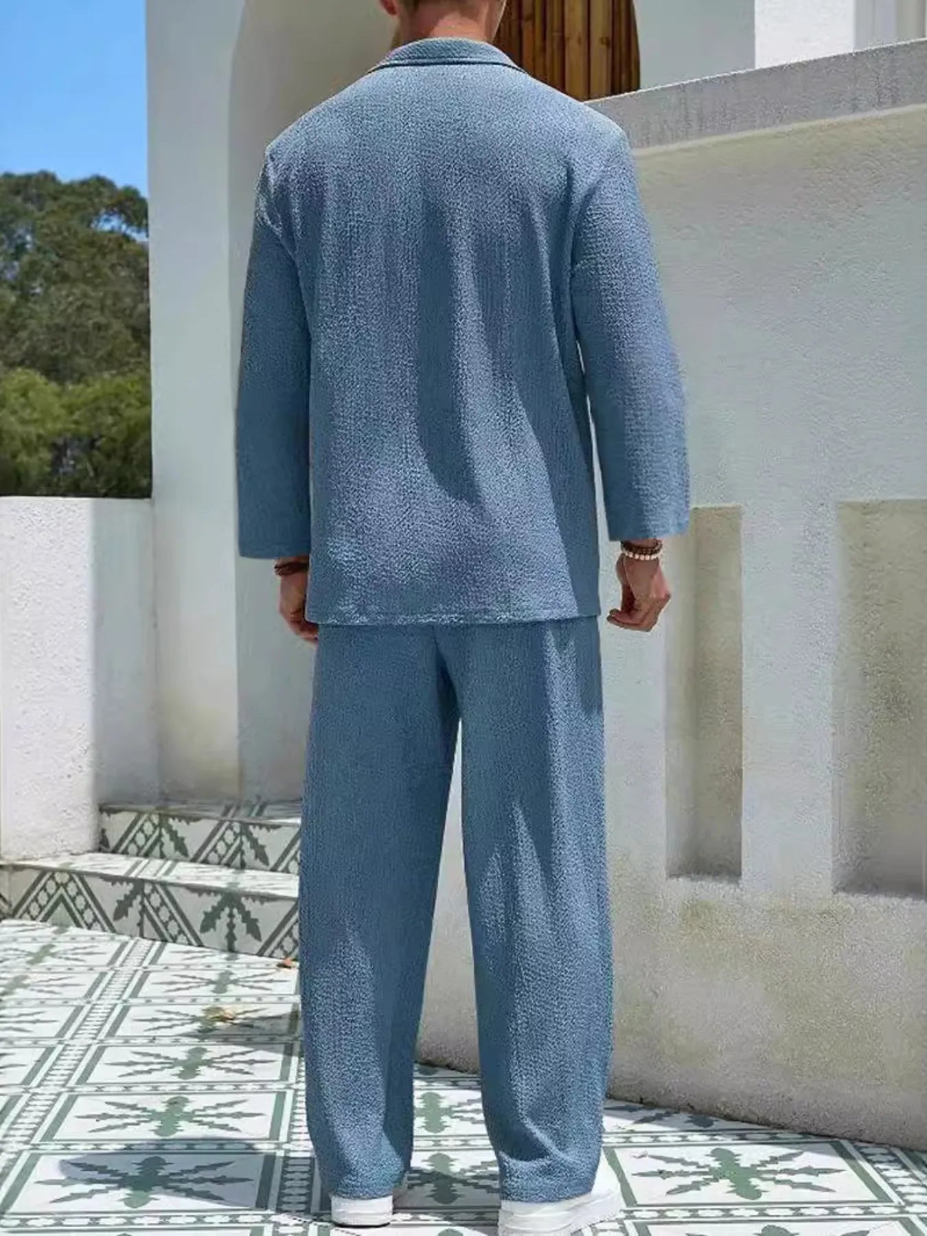 Men's long-sleeve top and pants set in lake blue, back view with long sleeves and pants