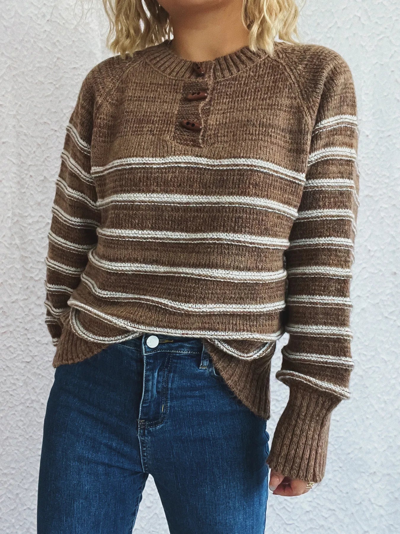Brown striped long sleeve sweater with small button placket and ribbed hem