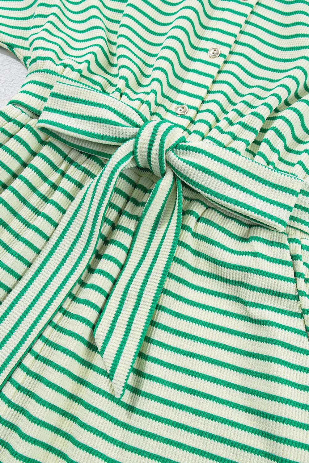 Green-and-white striped romper bodice with buttoned front and tied waist