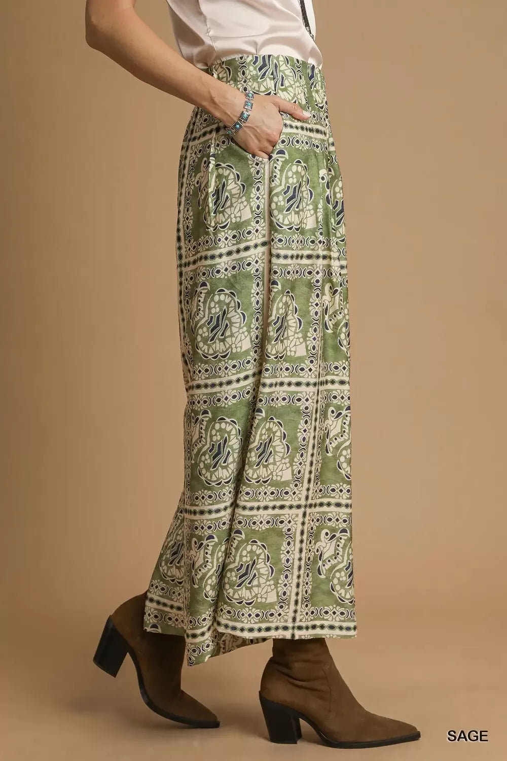 Sage green bohemian print pants with pockets, side view, wide-leg