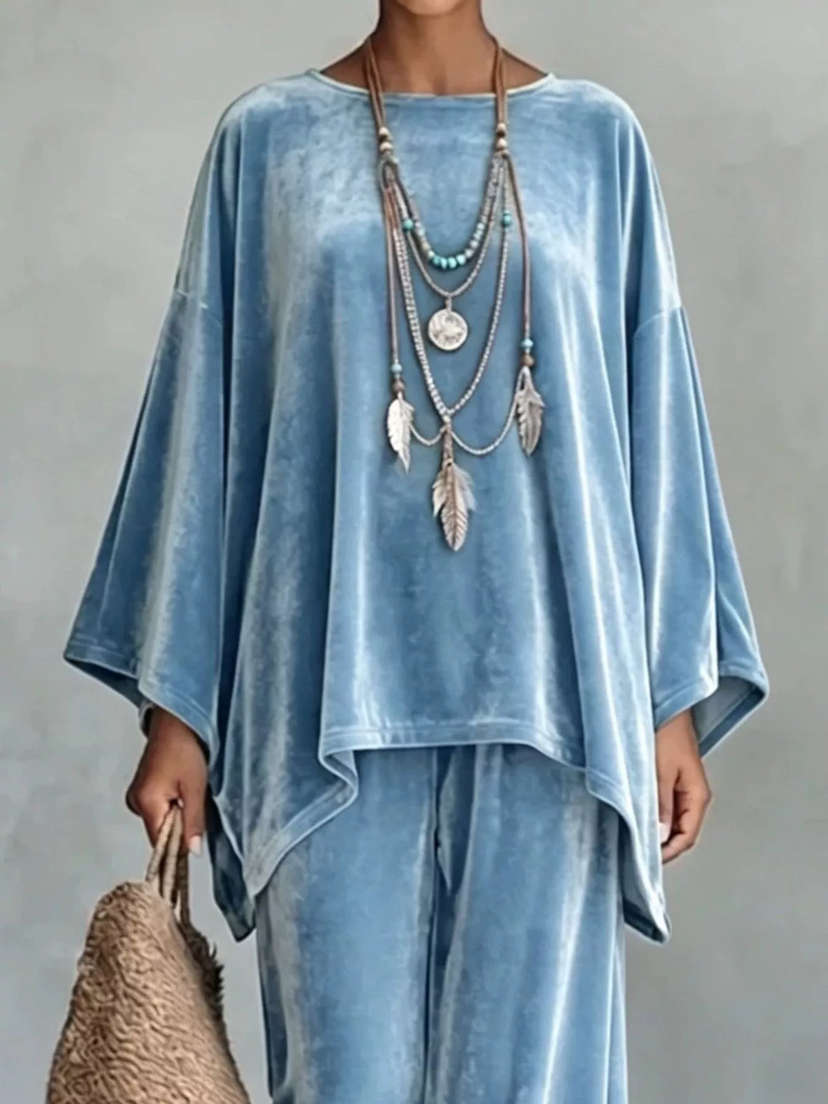 Light blue velvet asymmetrical poncho top and matching wide-leg pants set