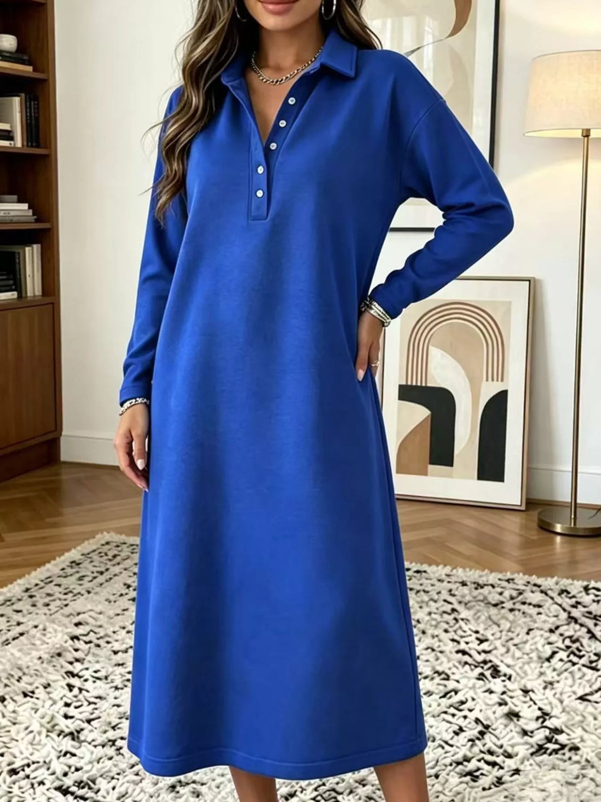 Blue polo midi dress with long sleeves and buttoned placket, collared neckline